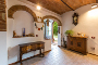 29.50 sq.m. sitting room with vaulted ceiling, stairs in hand made terracotta tiles and travertine stone