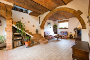 29.50 sq.m. sitting room with vaulted ceiling, stairs in hand made terracotta tiles and travertine stone
